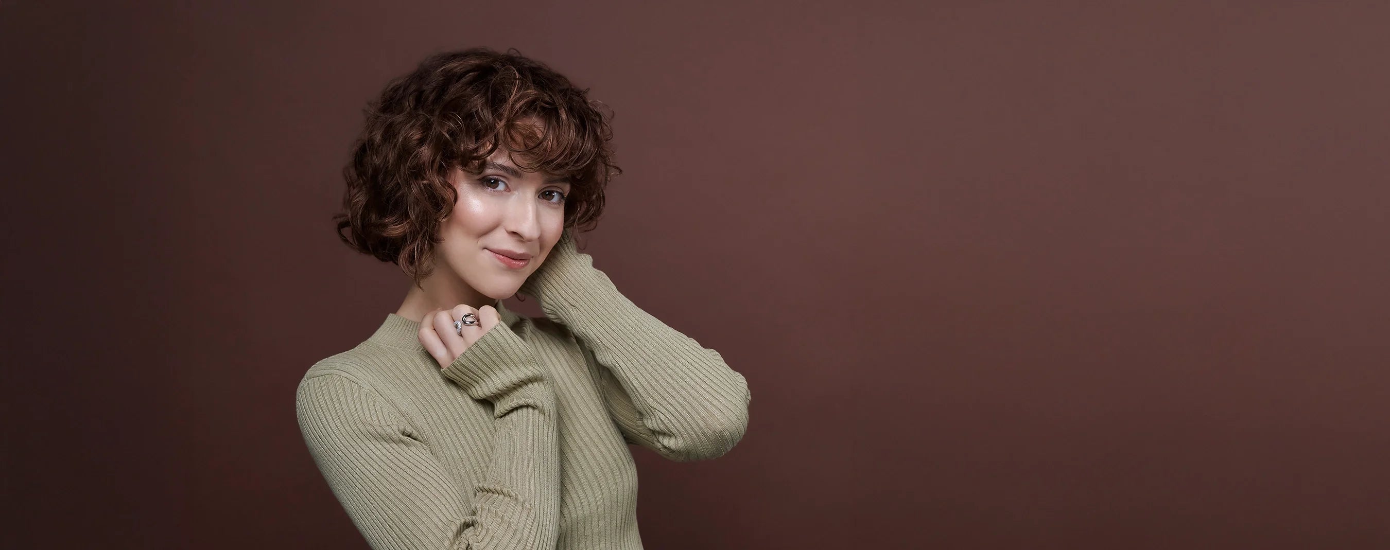 Curly Xclusive