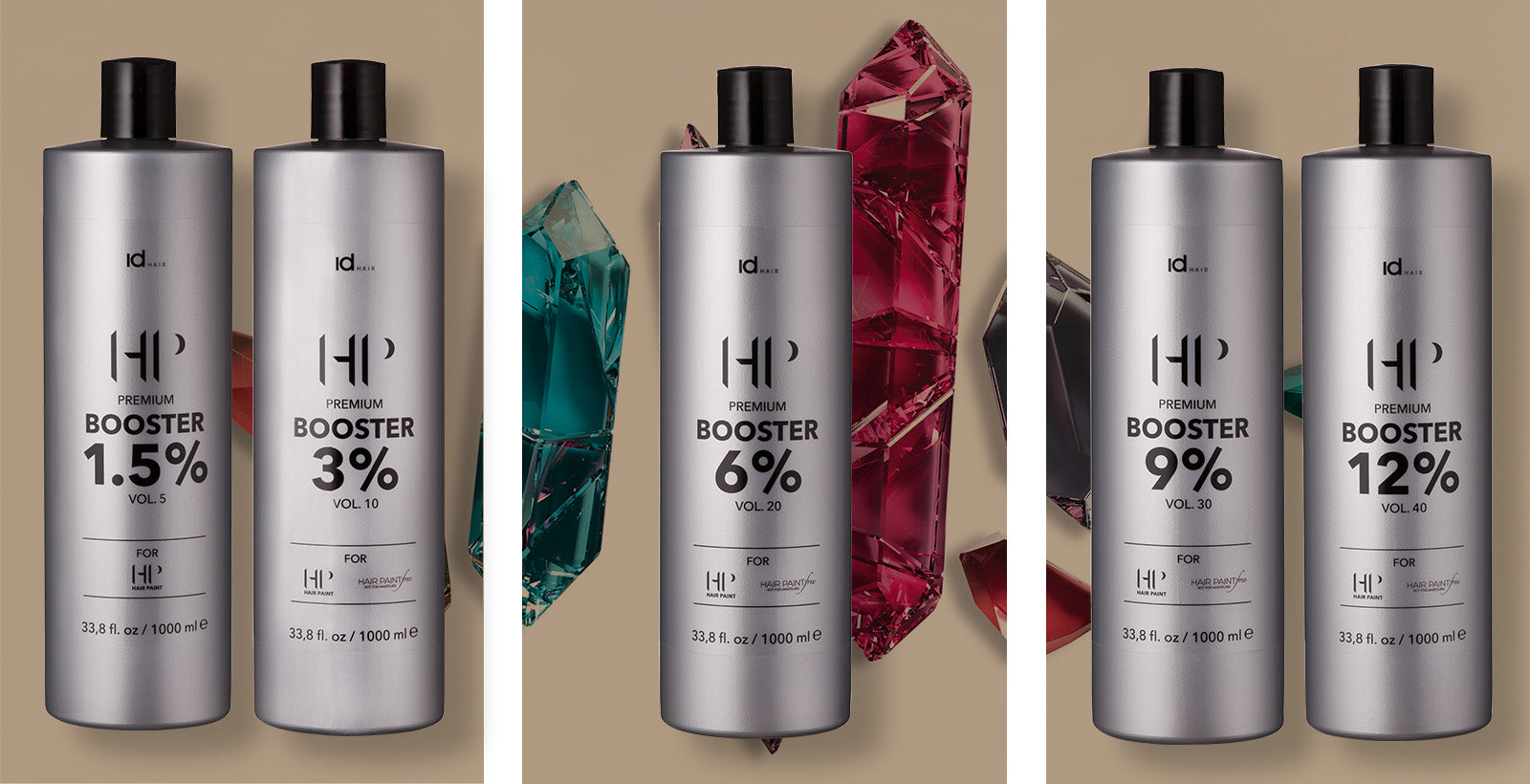 IdHAIR HP Premium Booster-flasker i sølvdesign foran farvede krystaller.